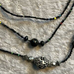 Layered Black and Silver Necklace with Decorative Beads